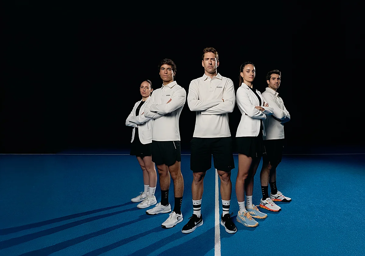Professional padel players on a blue court